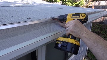 Installing gutter guards on a flat roof by Gutterglove