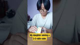 My Daughter Solving A Rubiks Cube. Great She Did It.