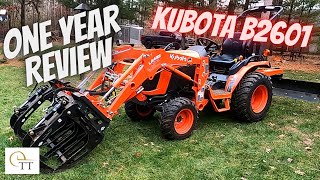 #111 Kubota B2601 One Year Review   Artillian Grapple  Best Small Compact Tractor  LA435 Loader