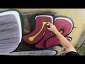 Graffiti full color bombing wall during the day - RESK12