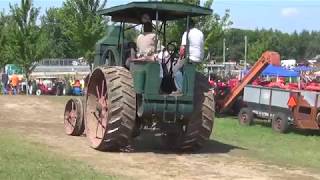 Barb gets a ride in the Rumely Oil Pull