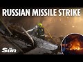 Rescue teams dig through rubble after Russian missile attack FLATTENS Ukrainian factory injuring 6