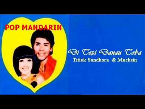 Ditepi Danau Toba - TITIEK SANDHORA  ( P'Dhede Ciptama ).wmv