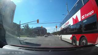 Dumb OC Transpo Driver goes through red light bus #8156 route 55 main street ottawa