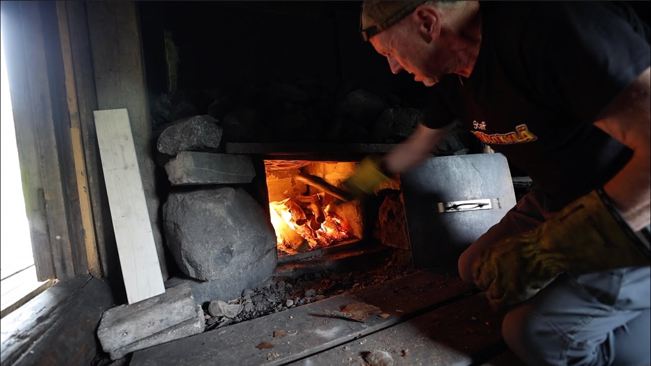 Learn to heat a smoke sauna with Saunologia at Saunakylä, Finland