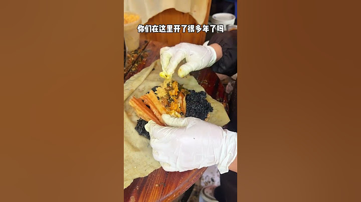 南京街头偶遇乌饭麻团，糯叽叽的超好吃！ #路边摊美食
