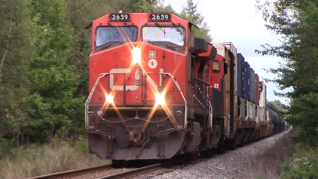 Long Manifest Train CN 594 West w/CMA CGM Containers Approaching River