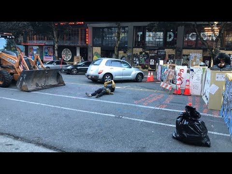 LIVE AERIALS: City crews show up with bulldozer in Seattle’s CHOP zone