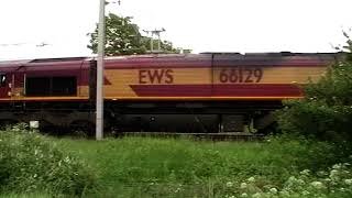 Hest Bank WCML stormed by DB 66129 hauling Freight June 2022
