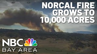 Northern California wildfire explodes overnight to 10,000 acres
