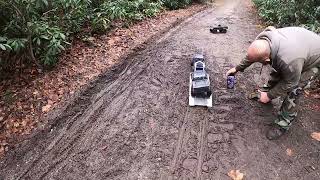 Mudding with the Traxxas 4 High trail with black mamba tires and the Trx 6 hauler offroading