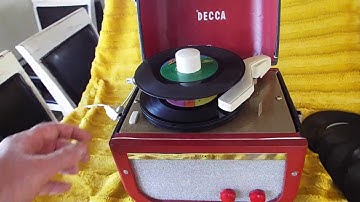 Decca RCA 45 record player playing a stack of 45
