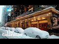 'Blinding snow' storm batters New York City and US north-east– video