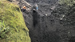 massive excavations in the cliff walls