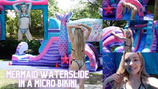 mermaid waterslide in a microbikini