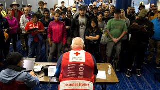 Thousands fill crowded Houston shelters as rescues continue