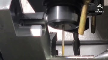 Turning small diameter with slot and side drilling no problem #Hardinge Turnmill