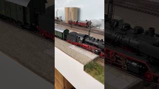 Steamlocomotive BR24 with passenger train entering the station.