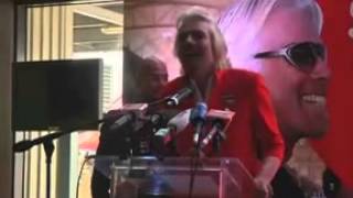 Sir Richard Branson dresses in drag after losing bet with AirAsia
