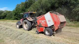 Case 5130 and welger rp200 round baler