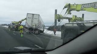 Slppery roads cause Tractor Trailler Accident and freak snow storm.