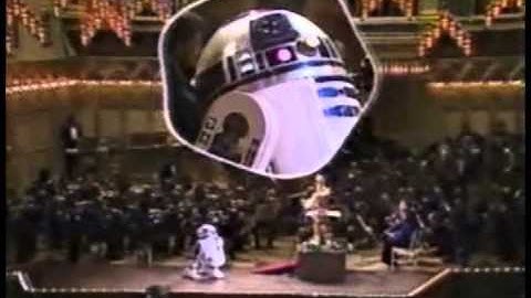 C-3PO Conducts Orchestra with R2-D2 for "Star Wars" Theme