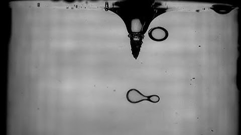 Pinch-off and deformation of an antibubble in vortex flow