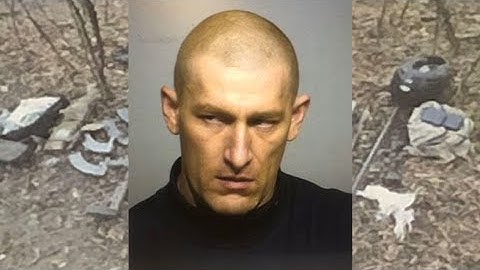 Man accused of firing shots into Milwaukee River, lived in bunker
