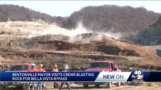 Crews blast rock for Bella Vista Bypass