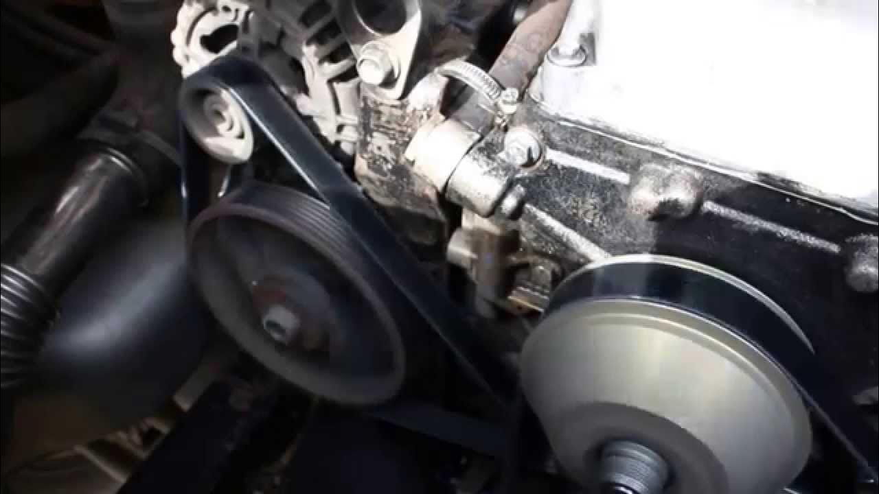 Уаз 409 приводного ремня паразитный. Как подтянуть ремень генератора уаз. Натяжитель ремня генератора уаз 409 двигатель. Натяжитель ремня генератора уаз 409 буханка. Ремень генератора уаз змз 409.