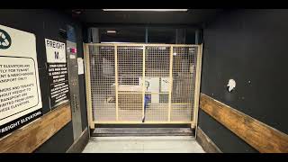 18:9: (Unknown Brand) Hydraulic Freight Elevator At The Galleria Dock M - Houston, Texas