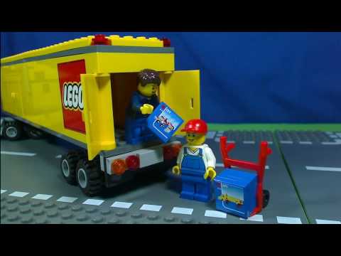 A detailed look at Lego City 60214 Burger Bar Fire Rescue with three minifigures, a fire truck that . 