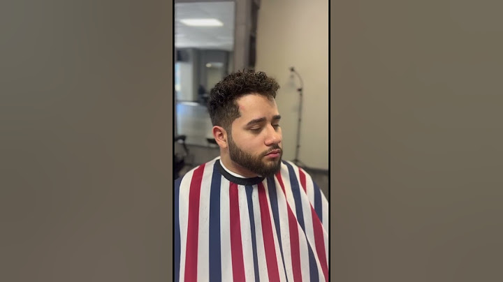 From Wild Mane to Stylish Frame: Transforming Big Hair into a Sleek Men’s Haircut