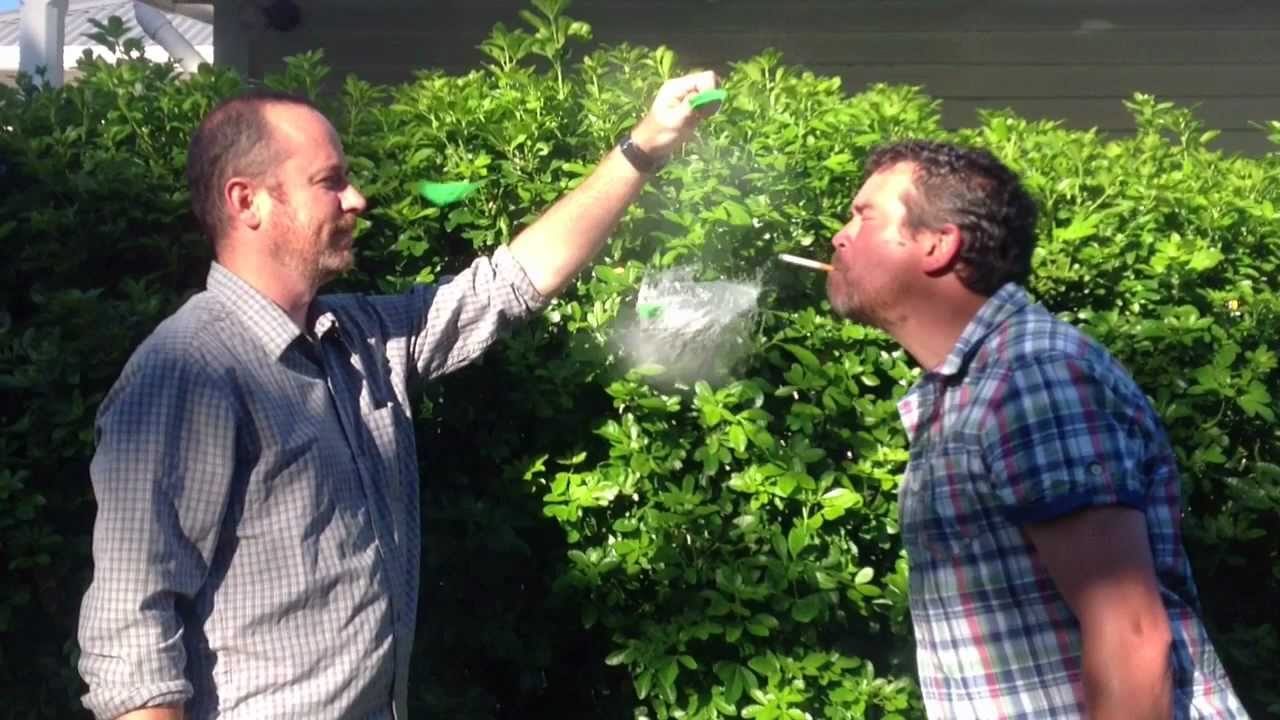 Two Dorks Popping Balloons In SlowMo