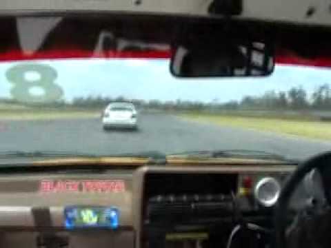 VK Commodore V8 vs Ford Escort V8 @ queensland rac...