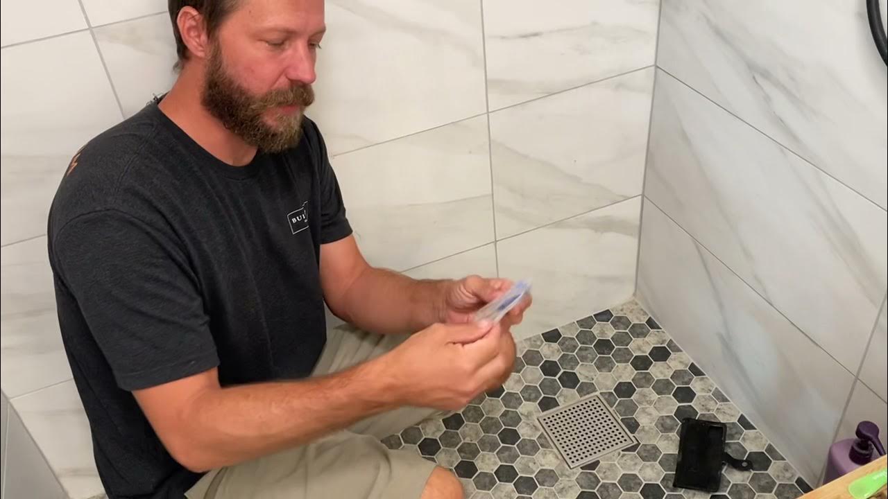 How to remove the new large square Oatley drain cover or similar YouTube