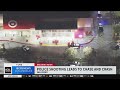 Police exchange fire with pursuit suspect in Target parking lot