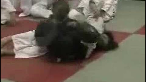 Armbar Setup From Pendulum Sweep With the GI