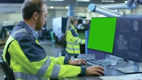 At the Factory: Mechanical Engineer Works | Stock Footage