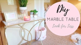 Happy Monday!! Today I have another DIY for you! I upcycled a mirrored entry table and turned it into a gorgeous marble and gold 