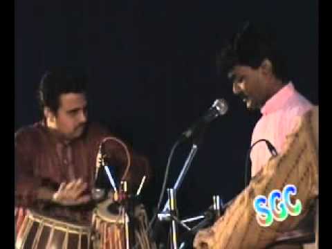 Presenting Marathi Bhajan sung by famous Hindustani vocalist Pt. Jayateerth Mevundi, Hubli. Recently came to Cochin for Hindustani Vocal concert and took everybody to another sphere like mother guiding her kid to beautiful world. He started with Rag Megh, with rainclouds accompany. Ended with famous bhajan, "Tirth vittal kshetra vittal". Accompanied him Sri Narendra L.Nayak on Harmonium and Sri Kesav Joshi on Tabla. Thanks to Bank of Maharashtra and Sangeet Bharti for arranging such a fantastic programme here. Thanks to every one for visiting here. Also visit my blog abhangavani.blogspot.com for lyrics