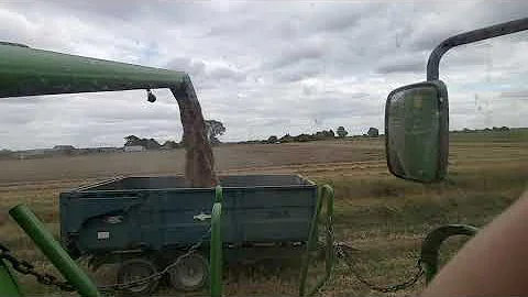 Dodging the rain John Deere W540