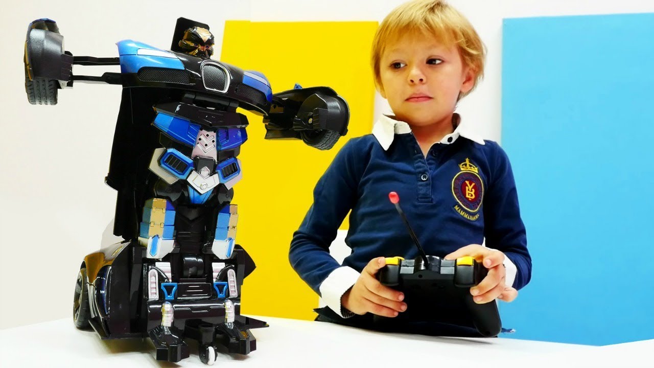 Папа она робот. Роботы для детей. Мальчик робот. Робот игрушка для мальчика. Робот машина на пульте управления.