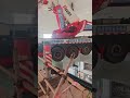 Dare to work on a car in mid-air?