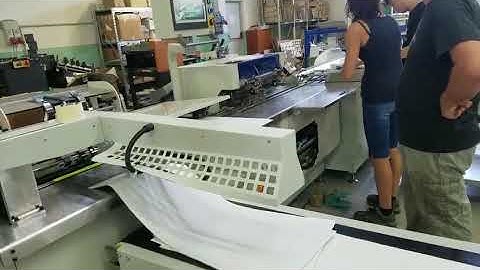 Automatic Twin loop wire binding and punching machine PBW580S work in Italy customer