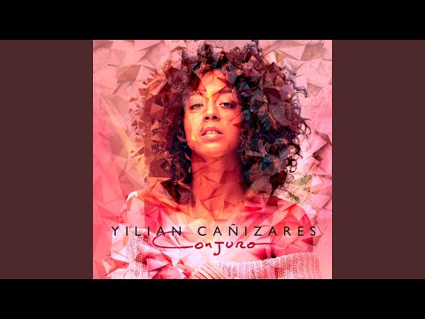 Conjuro (feat. Michael League)