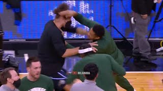 Giannis and Robin Lopez wrestling each other