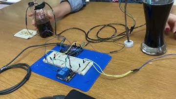 Llenado de botella por medio de optoacopladores y Arduino