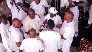 Wads of cash rain on Alao Malaika as he performs at the all white yatch party