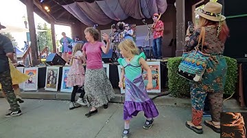Girls dancing with Hernandez Hideaway at Cotati Accordion Festival 2025 (11-2)